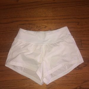 RARE WHITE LULULEMON SHORTS